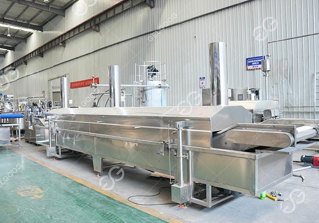 Máquina freidora continua de empanadas